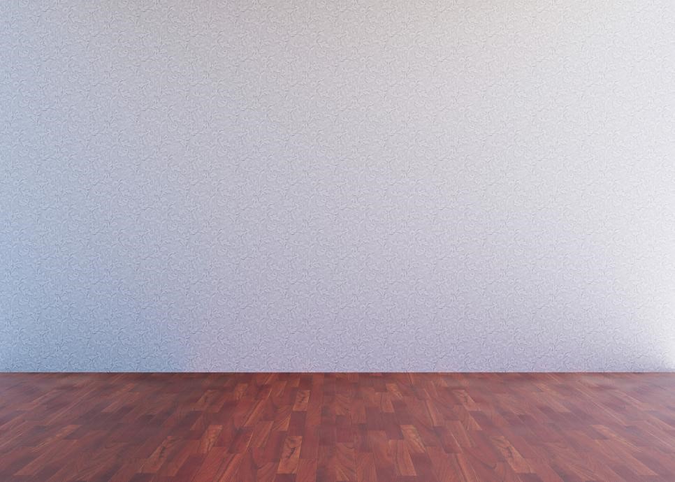 A room with a wooden floor.