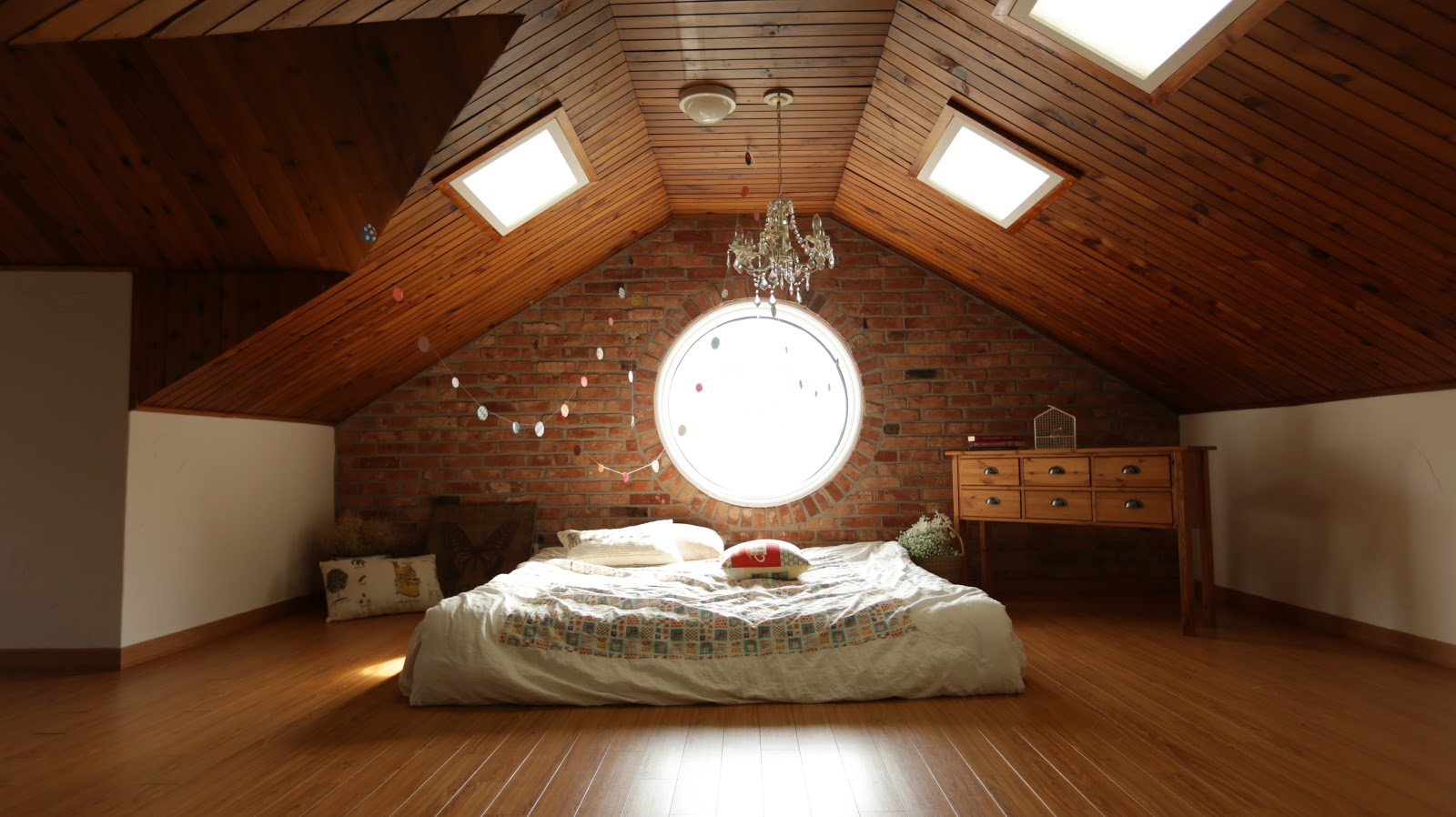 wooden room with a bed