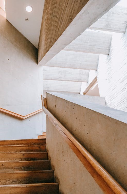 Empty wooden staircase and banisters.