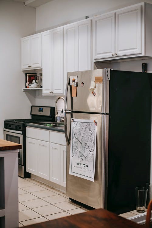 A white tiled kitchen