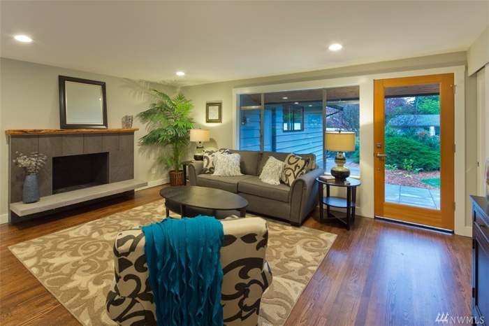 A living room with hardwood flooring