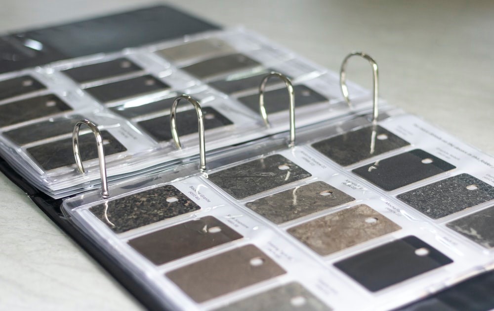 Laminate can mimic not just wood but stone and metallic styles too