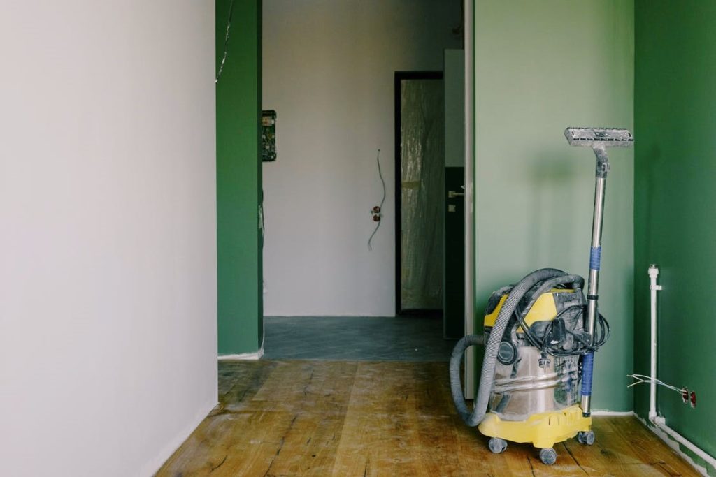 Hardwood floor refinishing with refinishing equipment