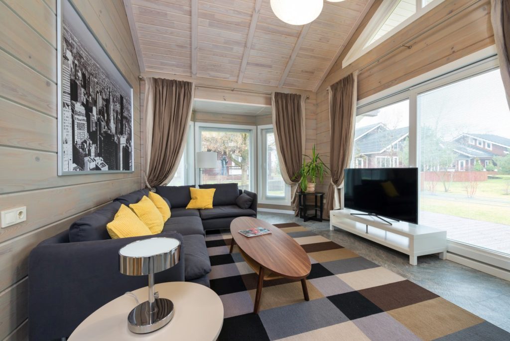 A wooden coffee table matching the room’s interior