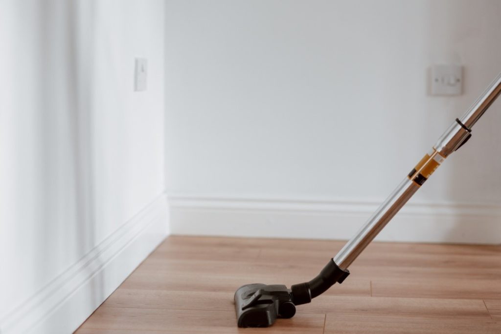 Vacuum cleaning a hardwood floor