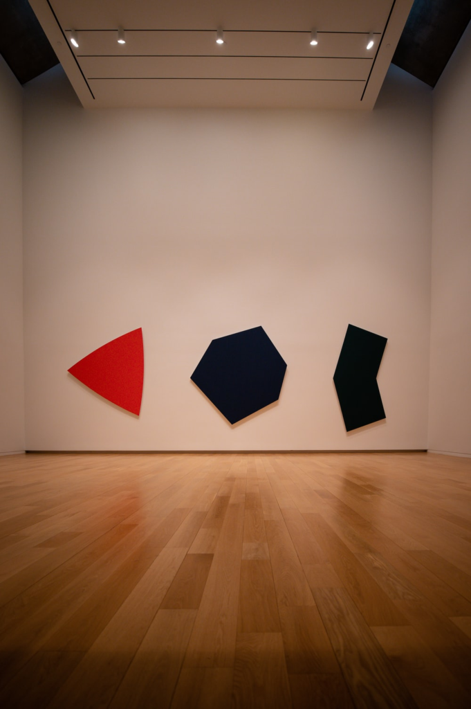 Art next to a wooden floor