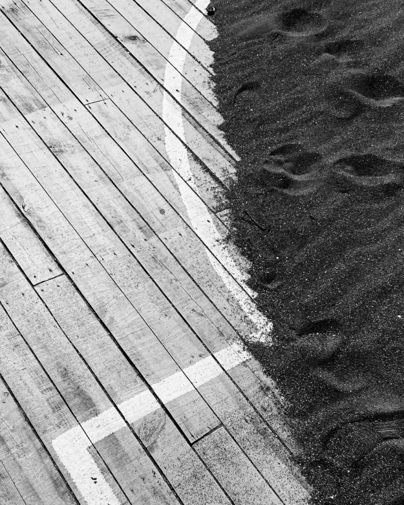 Black and white picture of freshly sanded hardwood floors