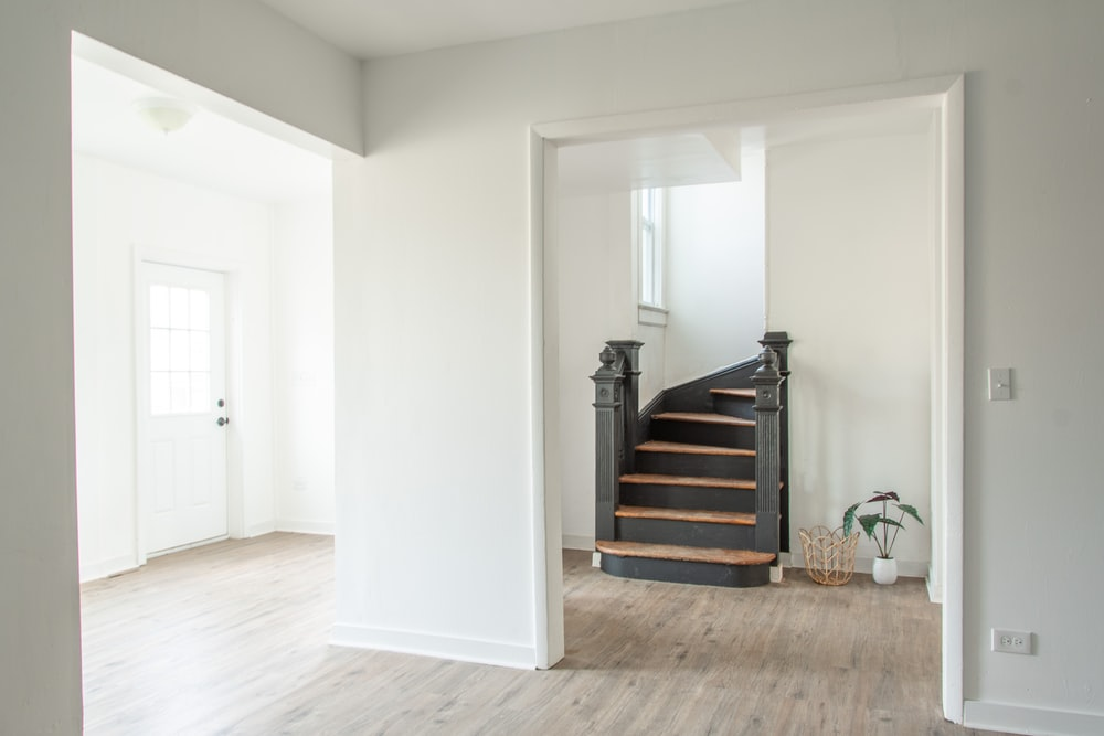 whitewashed hardwood floor in an empty house