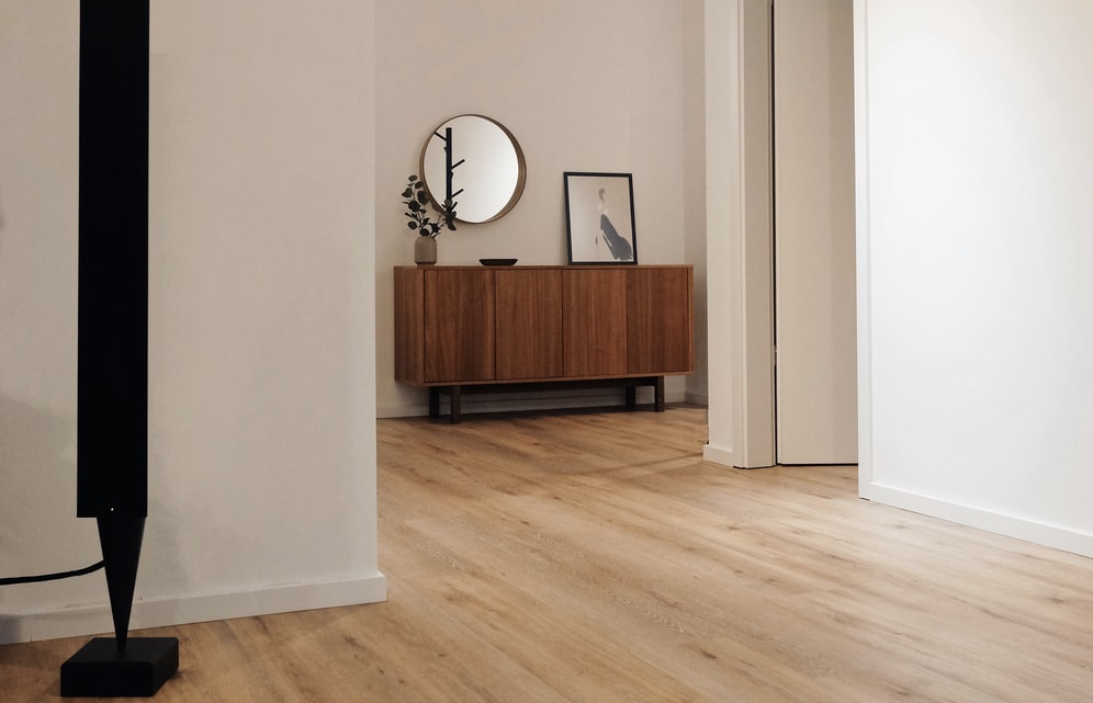 A new house consisting of a brand new hardwood floor