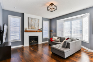 Contemporary living space in Redmond with dark hardwood flooring.