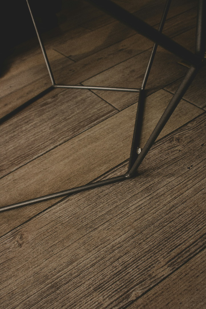 An image of metal rods on a wooden floor