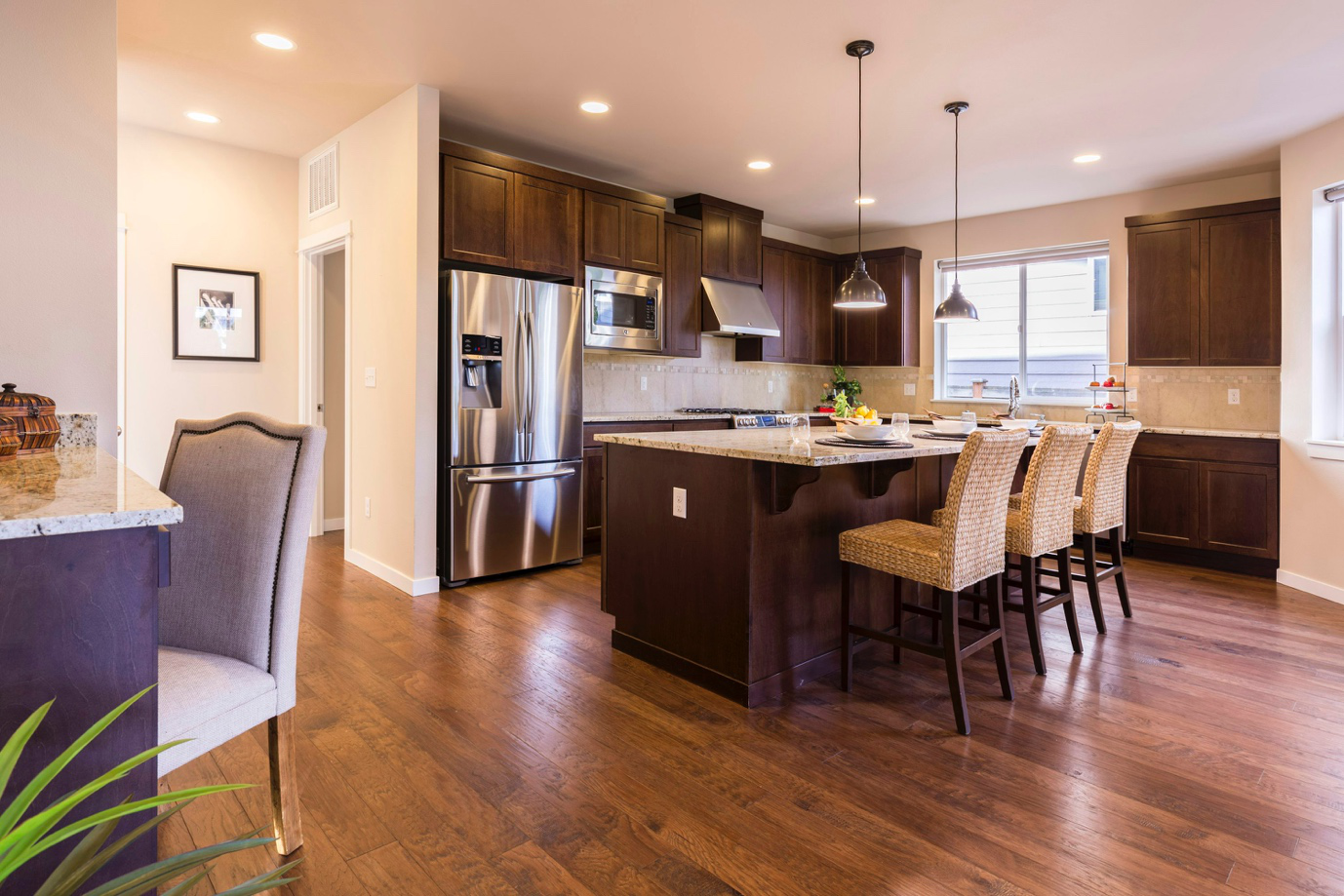 a kitchen with hardwood flooring