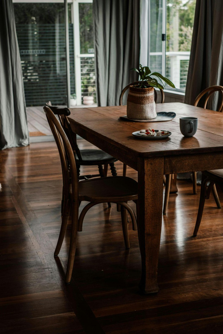 A brown table and chairs