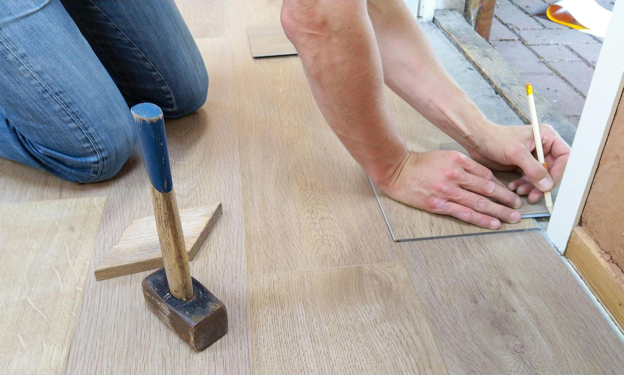 The Hardwood floor is being measured to replace